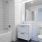 a bathroom with a tub toilet and sink