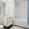 Bright, white tile bathroom