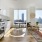 a kitchen with a table and chairs